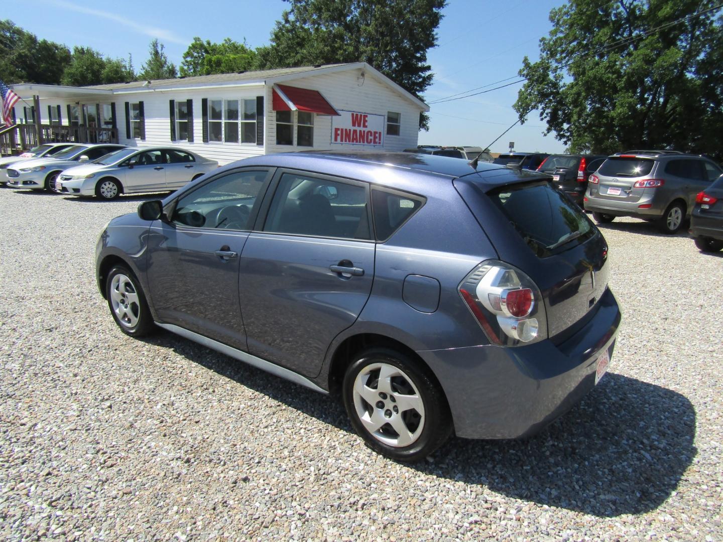 2009 Blue /Gray Pontiac Vibe 1.8L (5Y2SP67819Z) with an 1.8L L4 DOHC 16V engine, 4-Speed Automatic Overdrive transmission, located at 15016 S Hwy 231, Midland City, AL, 36350, (334) 983-3001, 31.306210, -85.495277 - Photo#5